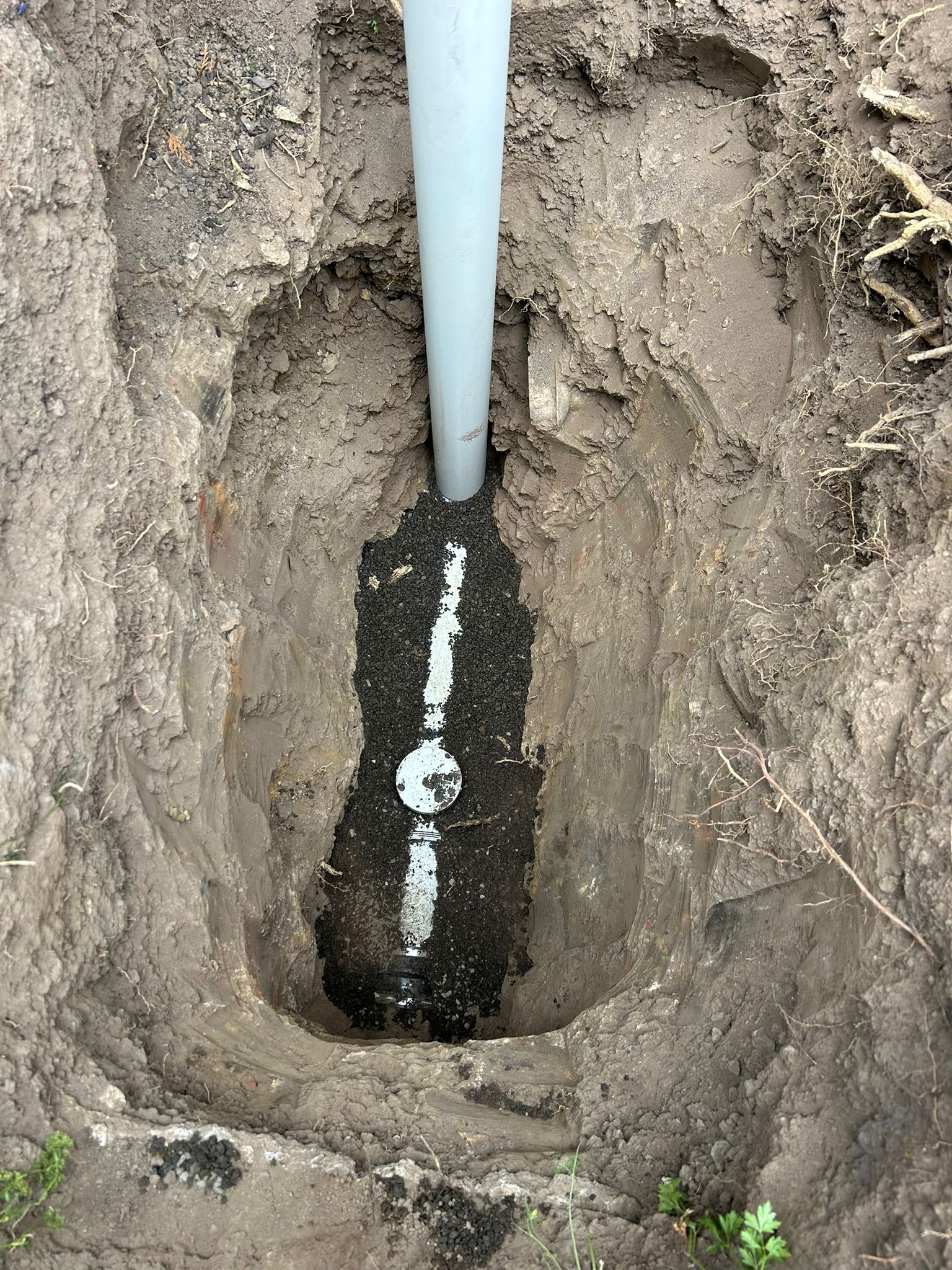 New PVC sewer pipe connected to old clay pipe excavation Heidelberg Melbourne